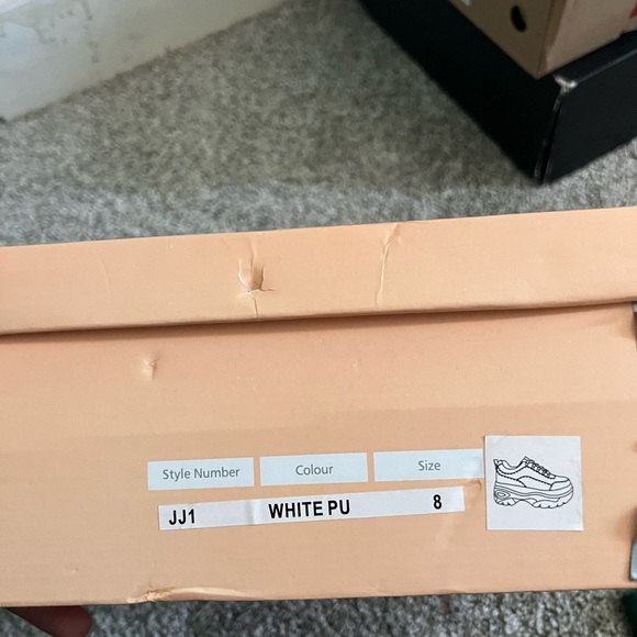 Never worn but does have some staining from the factory, women’s size 8 - Picture 7 of 9